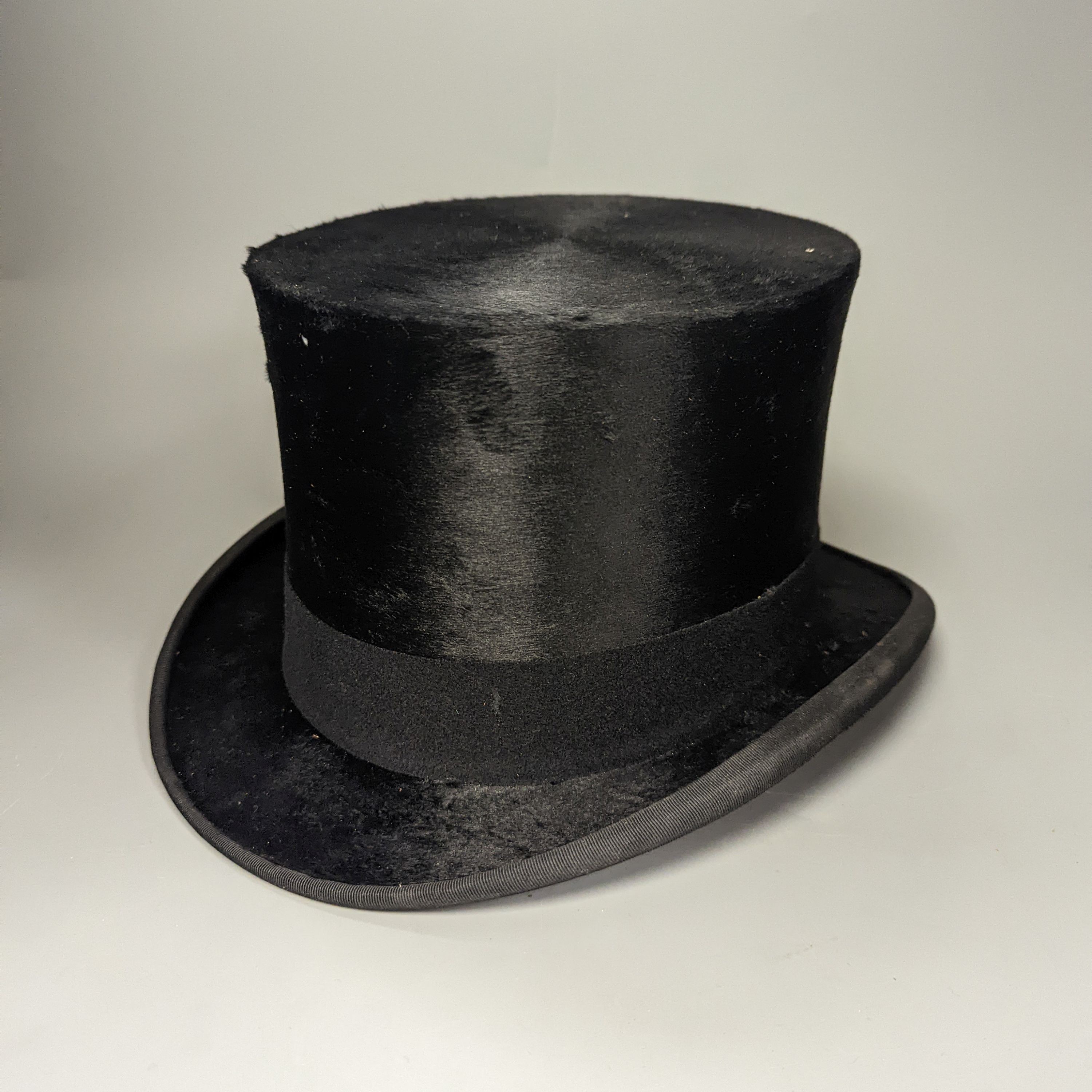 A Dunn & Co black top hat and box